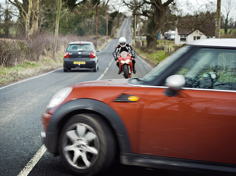 Car pulling out on motorcyclist